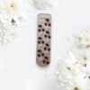 Cherry bookmark with white flowers