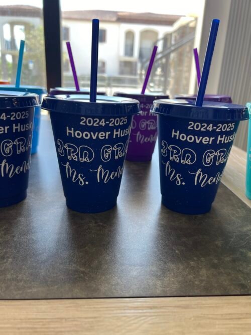 Custom glitter cups in royal blue and purple.