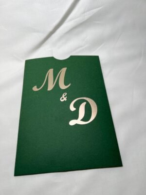 Green pocket envelope with initials